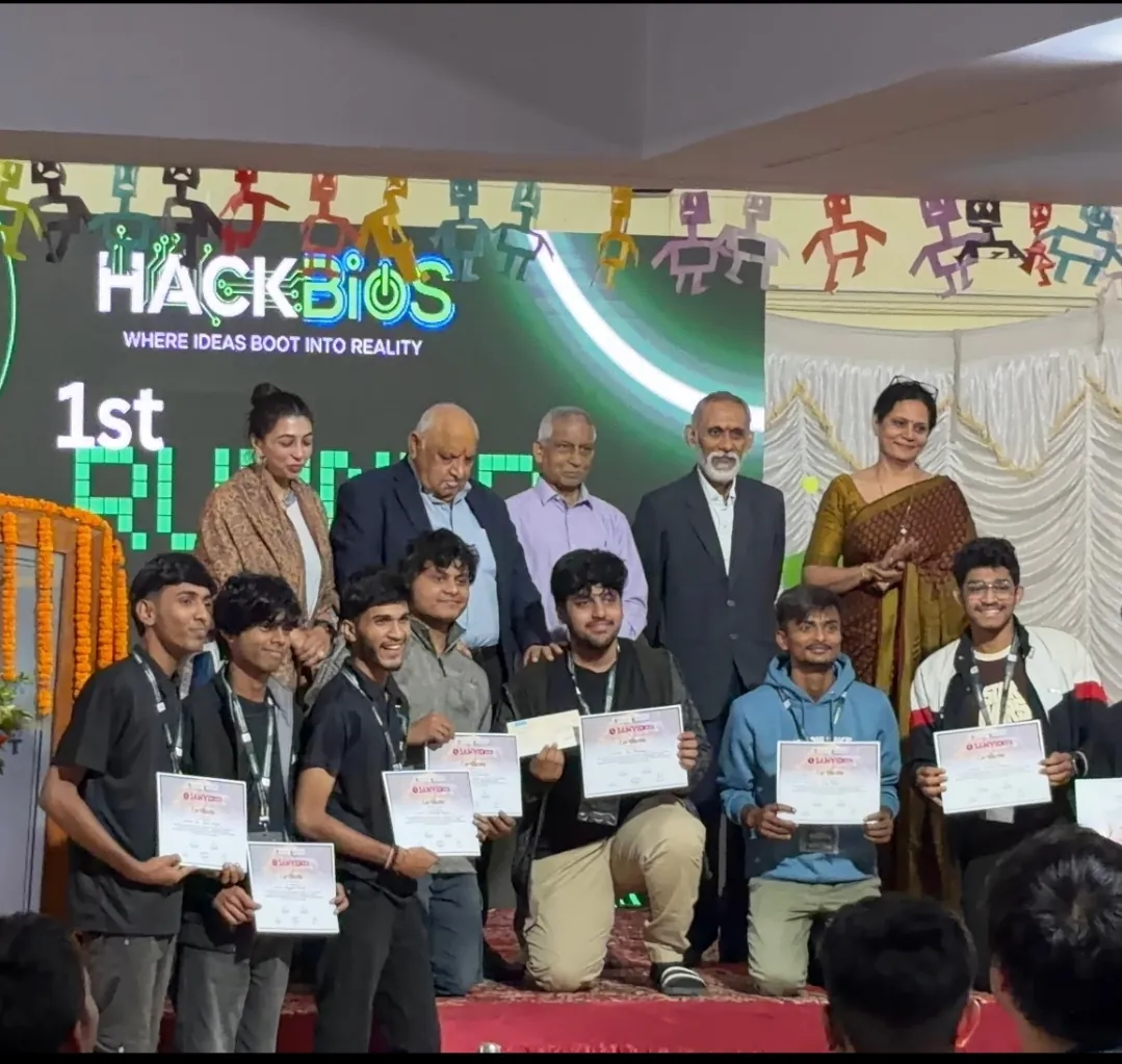 HackBios 1st runner-up team on stage with certificates